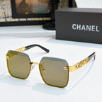 Chanel square sunglasses with gold frame and dark green tinted lenses