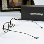 Metal eyeglasses with thin silver frame, dark temples, and blue-tinted lenses