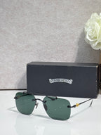 Chrome glasses with green-tinted lenses and dark metal frame, front view