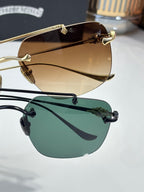 Chrome glasses set with brown and green tinted lenses, metal frames shown