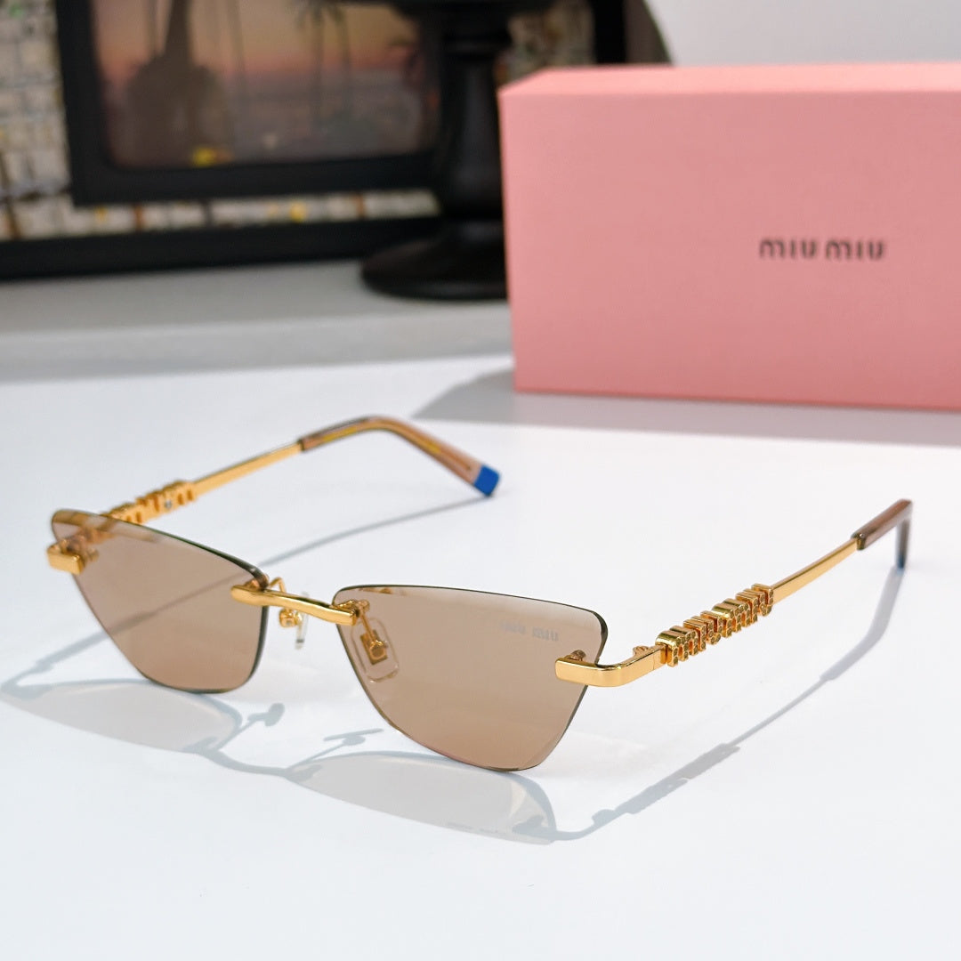 Gold-tone sunglasses with dark-tinted lenses and jeweled chain-style temple detail