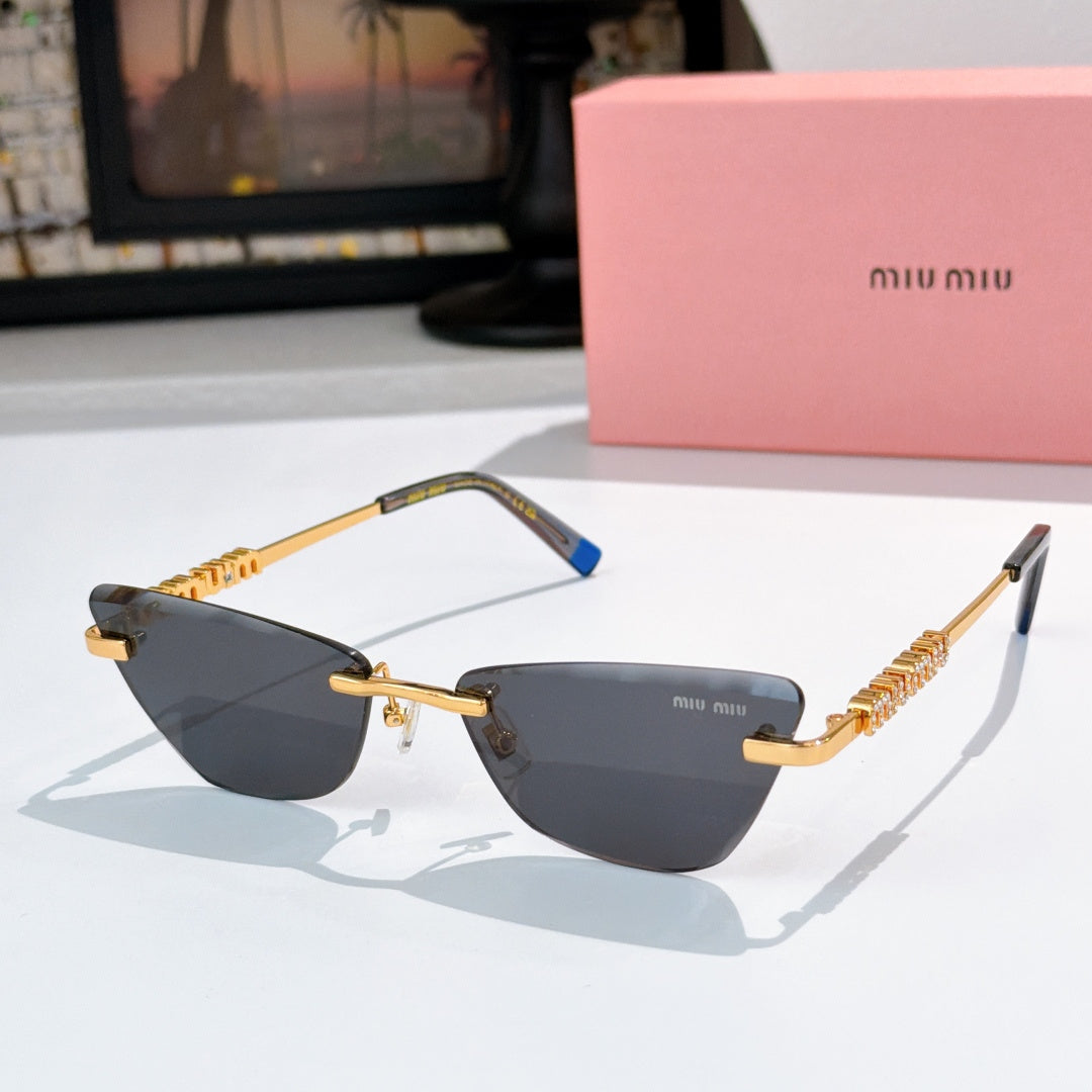 Gold-tone sunglasses with dark-gray tinted lenses and jeweled chain-style temple detail