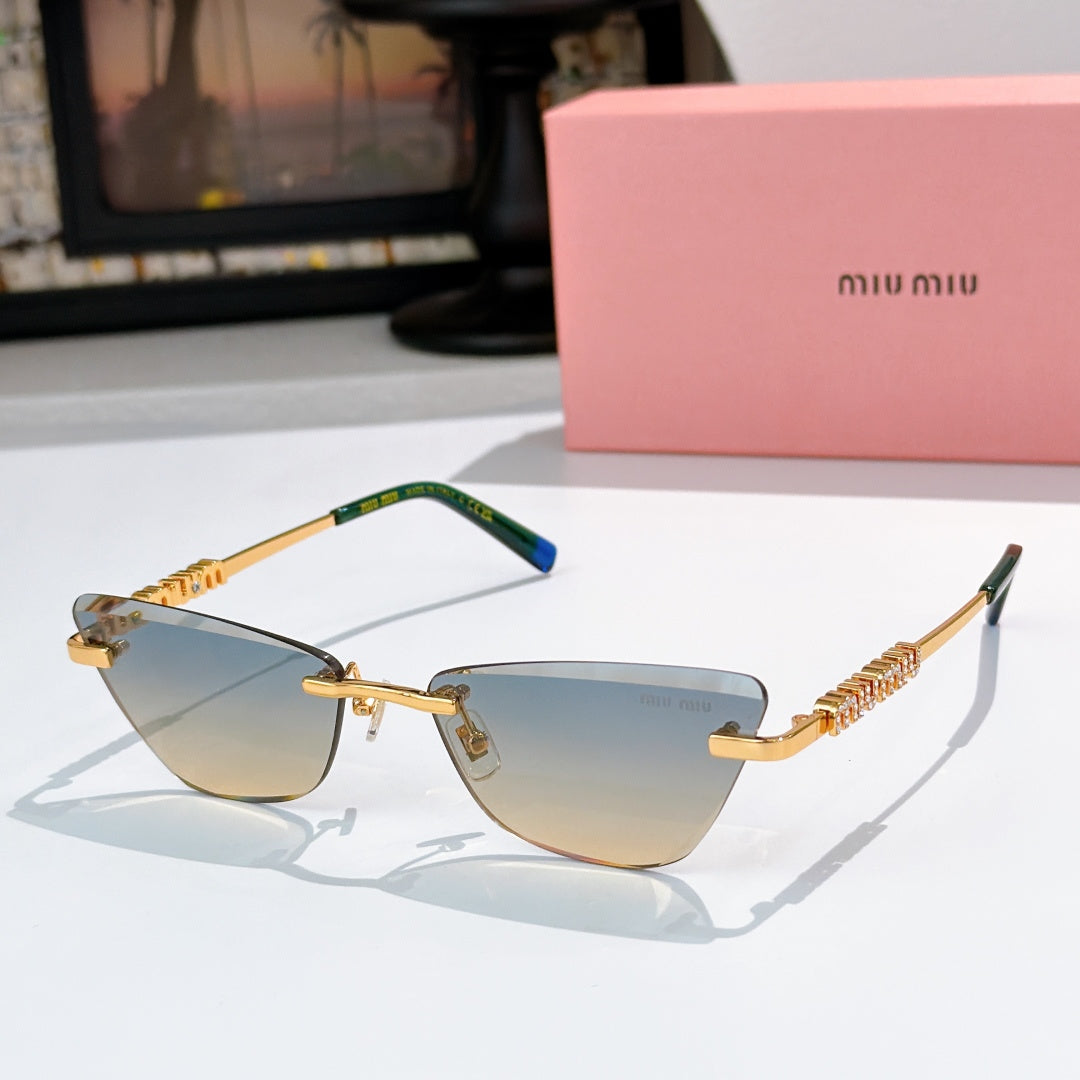 Gold-tone sunglasses with amber-tinted lenses and jeweled chain-style temple detail