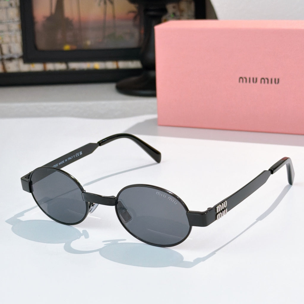 MiuMiu round sunglasses with black frames, dark lenses, and branded metal temple details