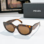 Prada cat-eye sunglasses with brown lenses, tortoiseshell frame