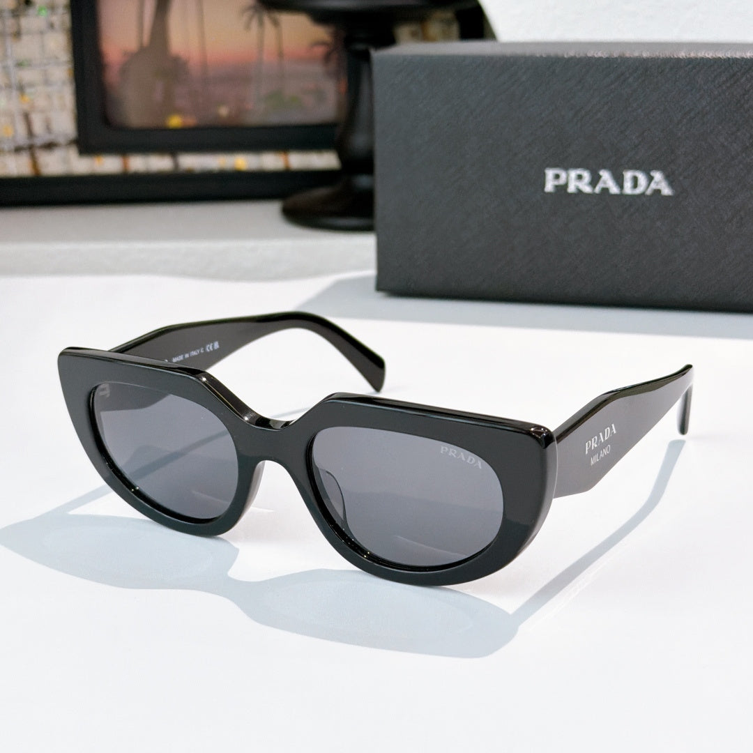 Prada cat-eye sunglasses, side profile, black frame with dark lenses