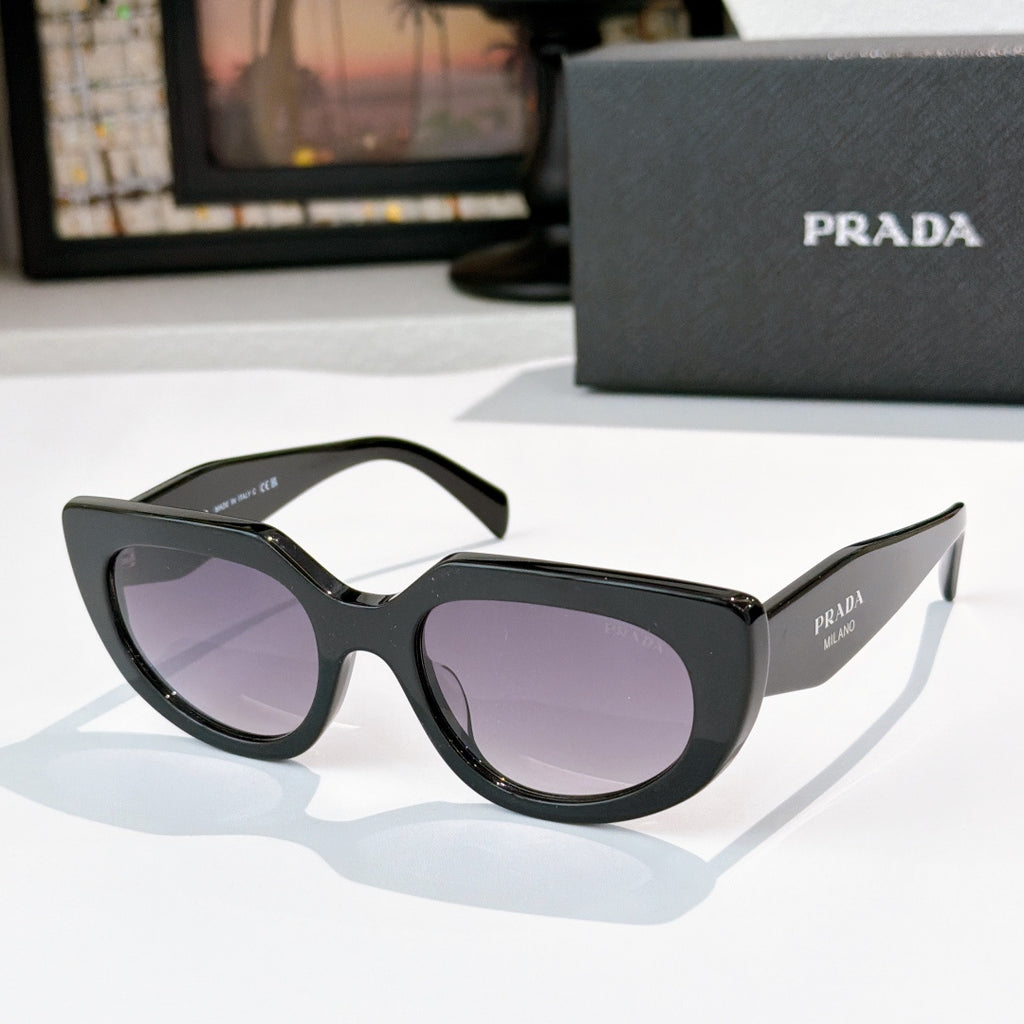 Prada cat-eye sunglasses with purple lenses, black frame