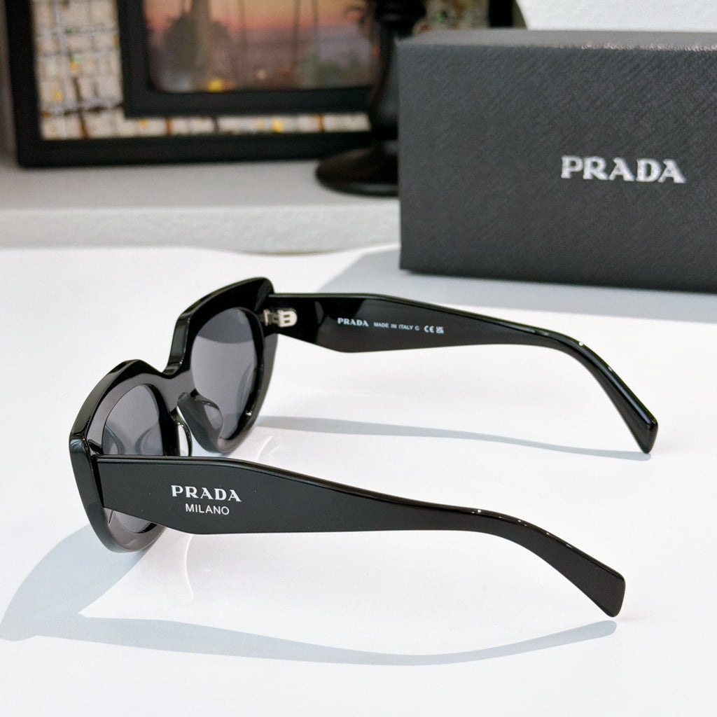 Prada cat-eye sunglasses, black frame with dark lenses, temple logo