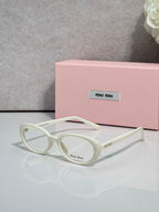 Eyeglasses with cream white round frames and clear lenses, branding on temple.