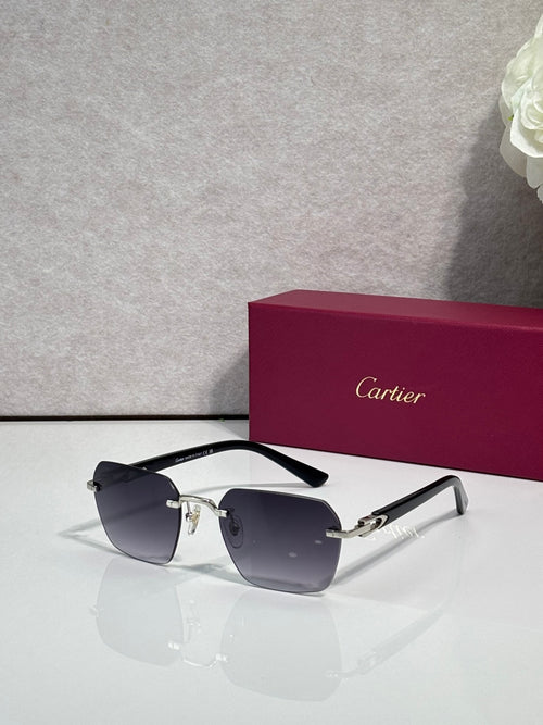 Cartier sunglasses with dark blue gradient lenses and black frame