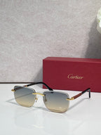 Cartier square sunglasses with clear gray lenses, black frame, and gold-tone bridge