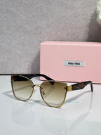 Tortoiseshell round glasses with smoke gradient lenses and gold-tone bridge details