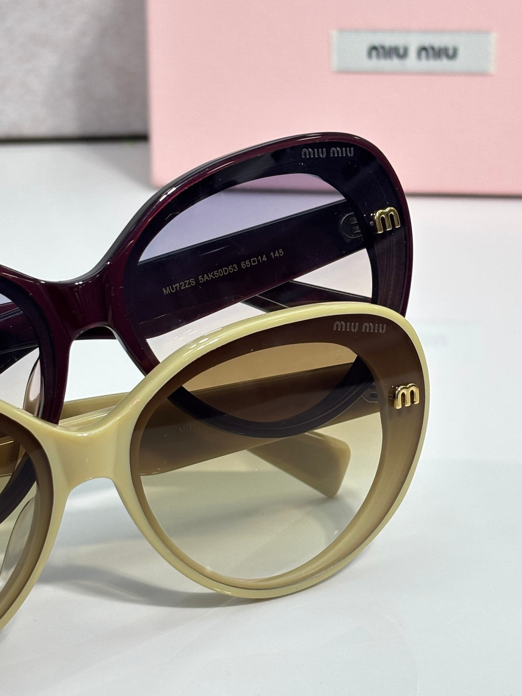 MiuMiu burgundy and light lime round sunglasses with gold logo arms