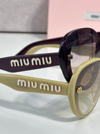 MiuMiu burgundy round sunglasses with lime green arms and gold logo