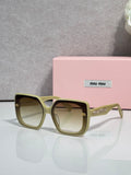 Square sunglasses with pale green frames and dark lenses