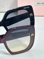 Two-tone square sunglasses with navy top frame and burgundy bottom