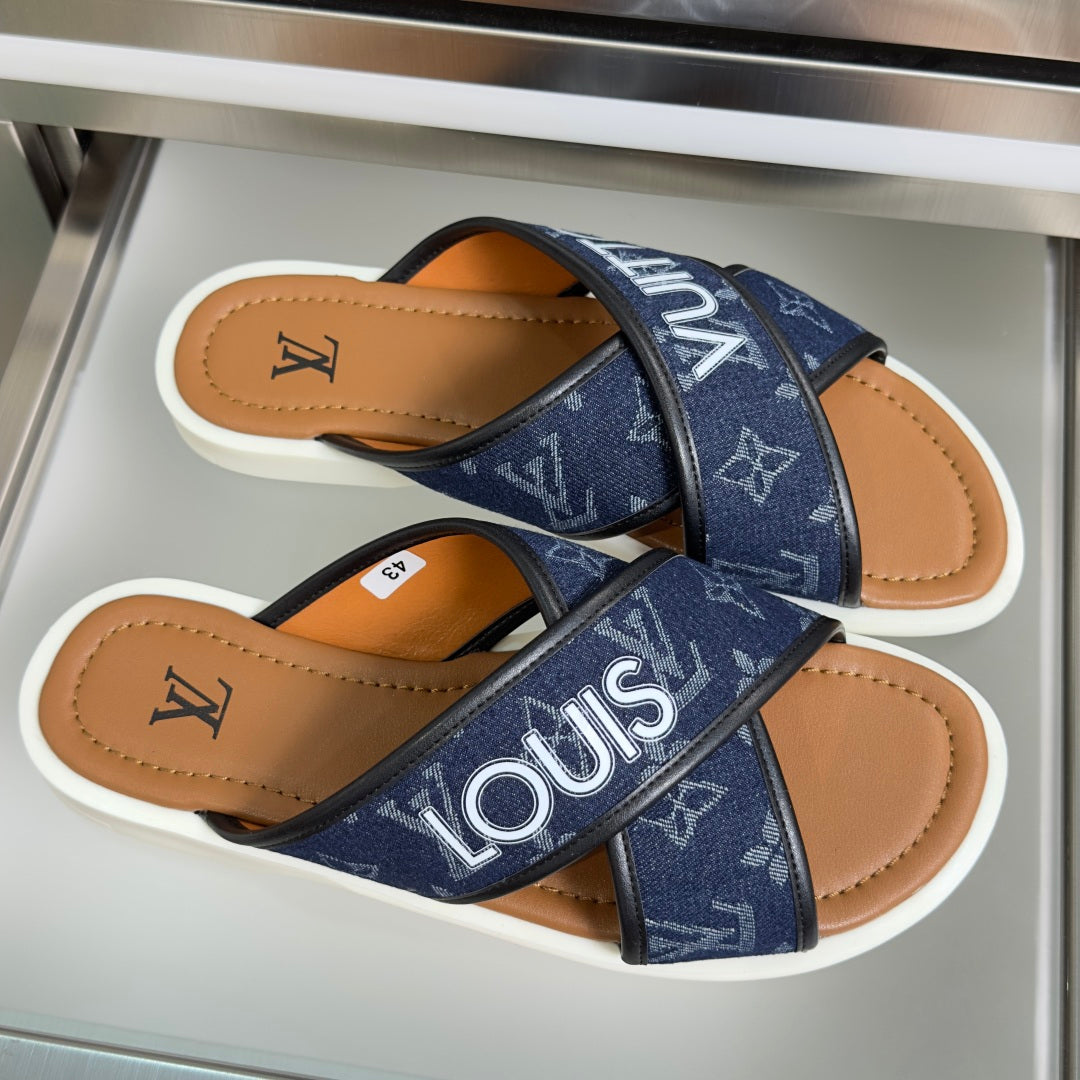 Navy Louis Vuitton sandals, cross strap design with tan leather lining, white soles