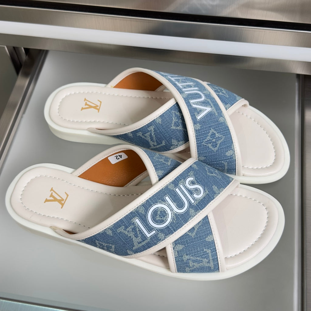 Louis Vuitton logo sandals, blue monogram two-strap design on white cushioned footbed