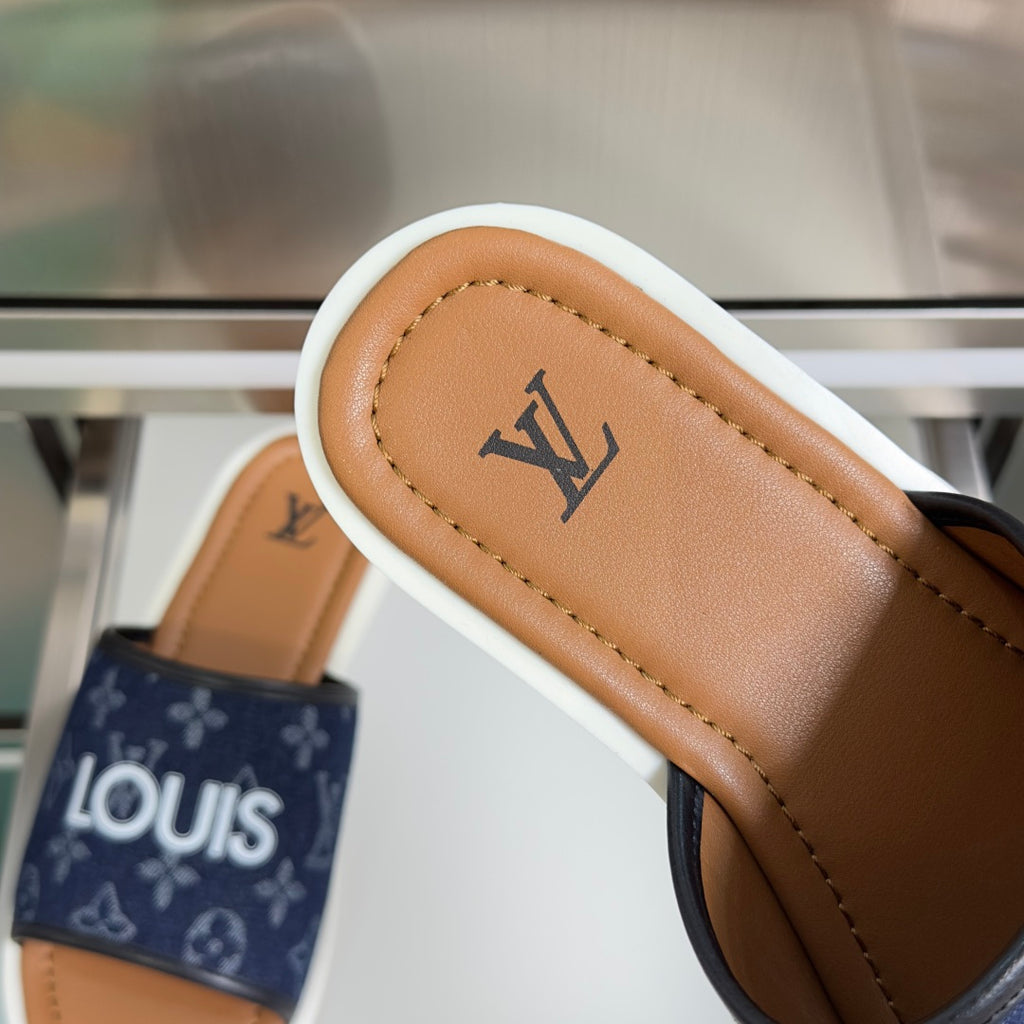 Louis Vuitton slide sandals with tan leather footbed and navy monogram strap