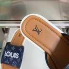 Louis Vuitton slide sandals with tan leather footbed and navy monogram strap