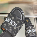 Louis Vuitton monogram slide sandal front strap with white logo print and black base