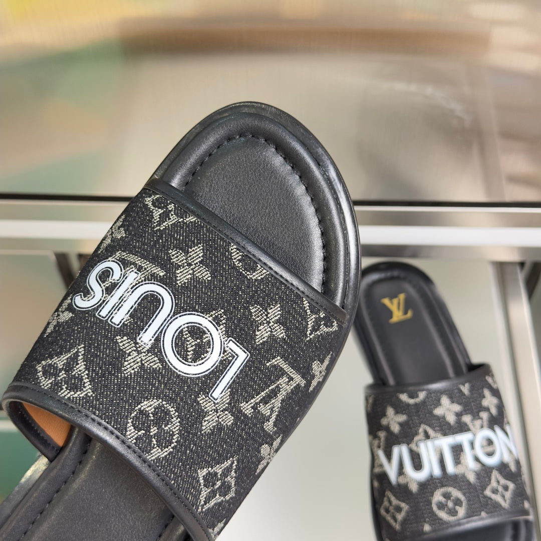 Louis Vuitton monogram slide sandal front strap with white logo print and black base