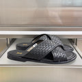 Louis Vuitton black woven-slide sandals, cross strap and flat sole