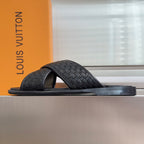 Louis Vuitton black woven slide sandals with wide strap and low profile sole