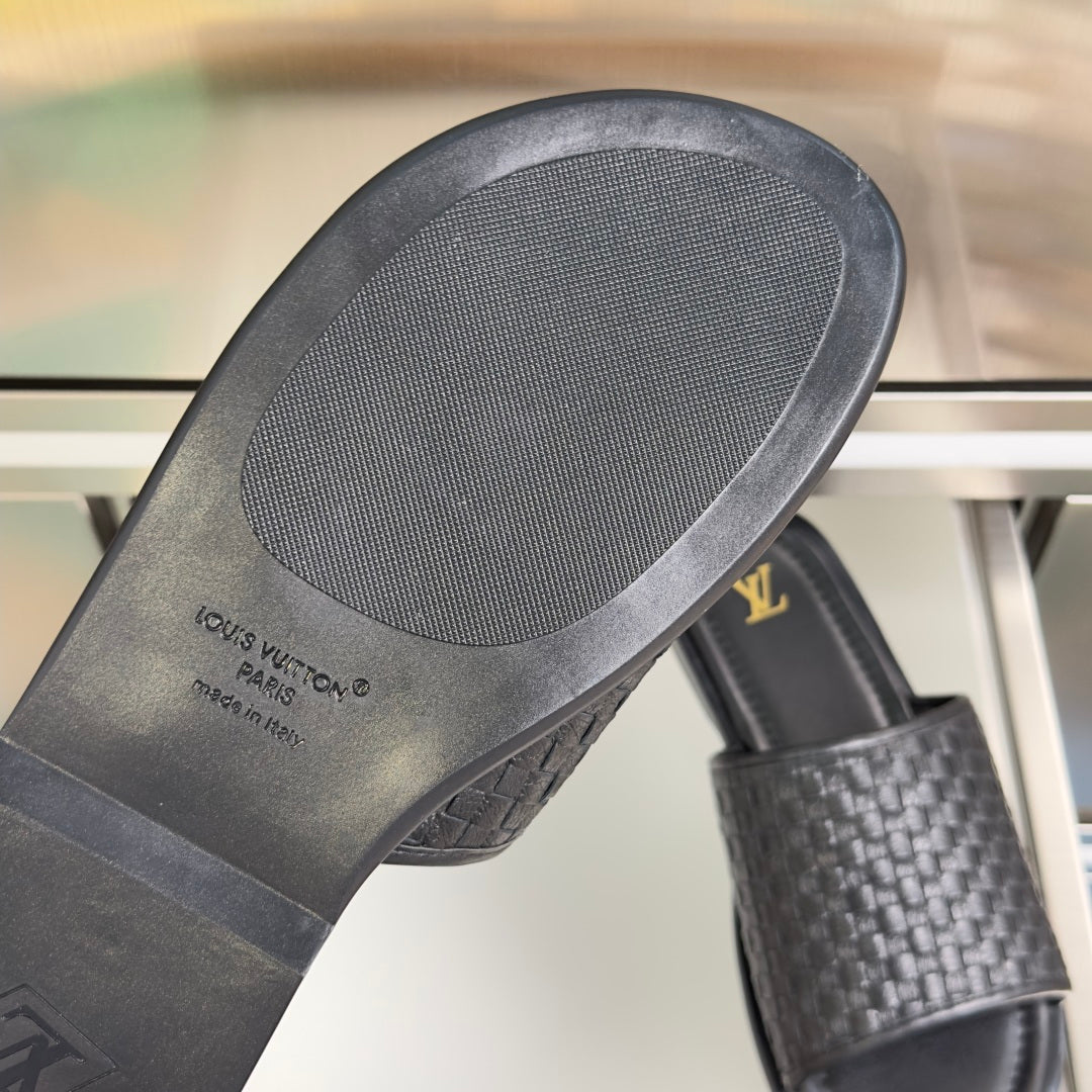 Black slide sandal insole with Louis Vuitton Paris branding
