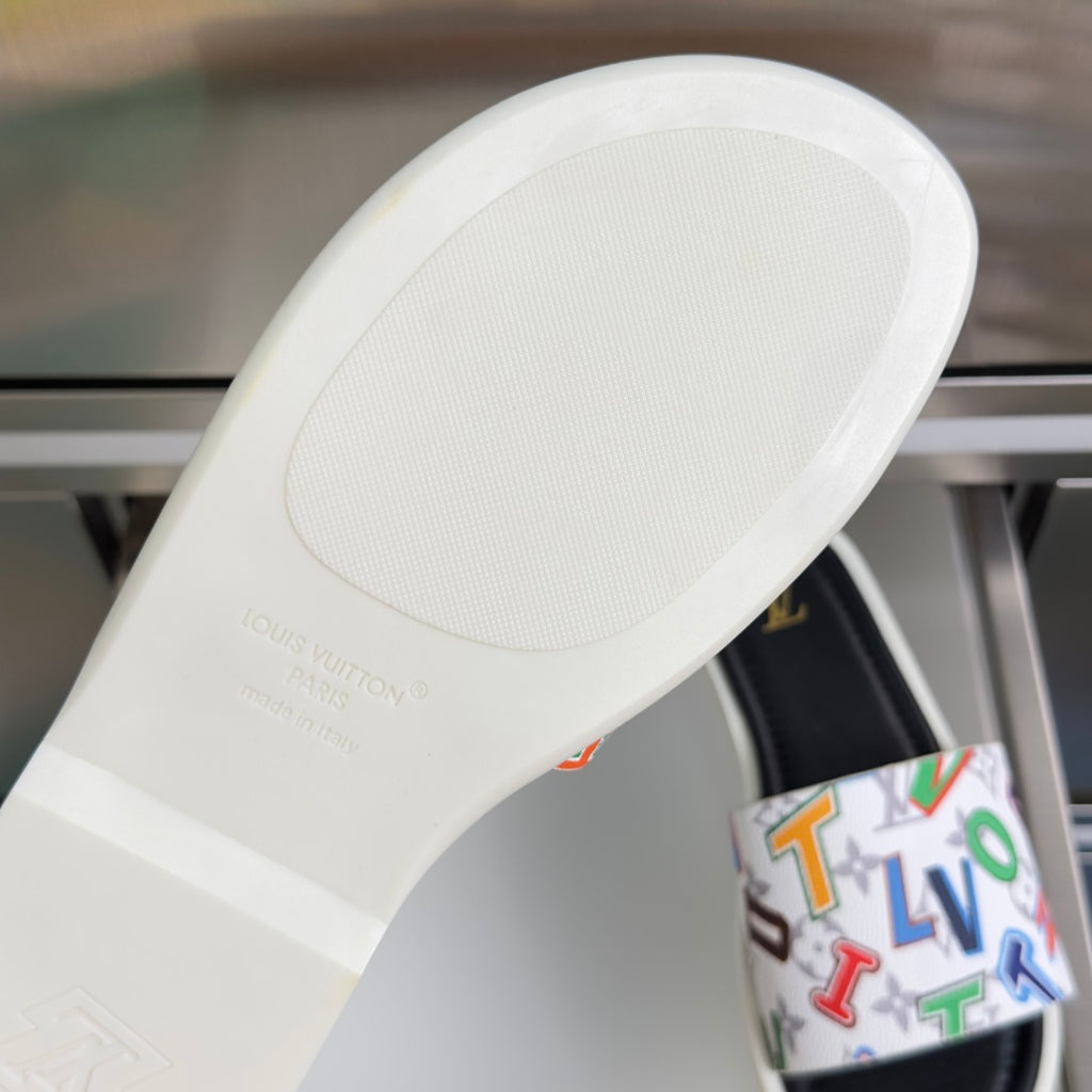 White slide outsole with embossed LV logo