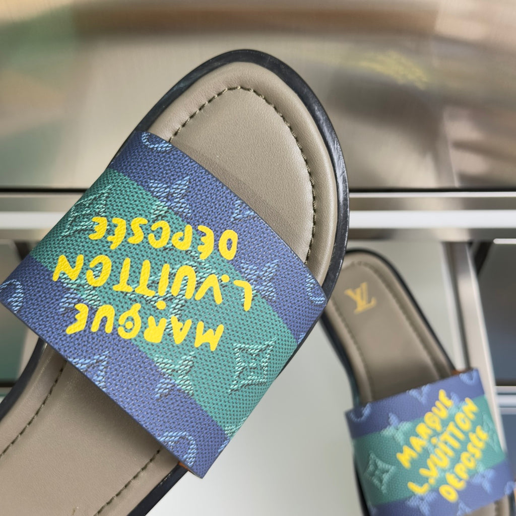 Louis Vuitton sandal close-up with multicolor monogram strap over beige footbed