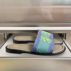 Louis Vuitton slide sandals with multicolor monogram strap and black rubber sole