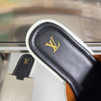 Louis Vuitton slide sandal footbed close-up, dark leather with gold LV logo
