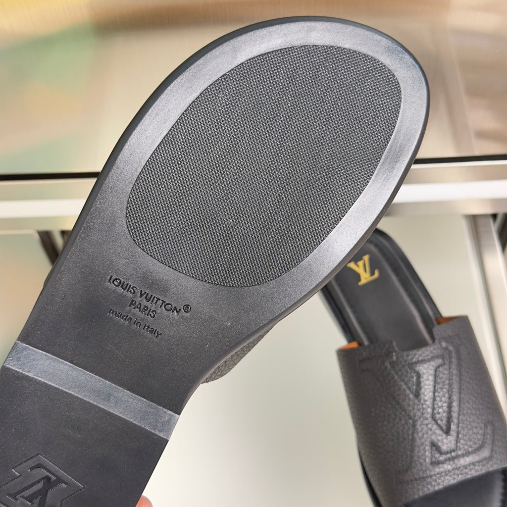 Gray outsole with textured footbed and Louis Vuitton Paris stamp