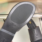 Gray outsole with textured footbed and Louis Vuitton Paris stamp