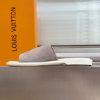 Louis Vuitton suede slide sandals with white footbed and low-profile strap