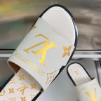 Louis Vuitton sandal strap detail, white band with gold monogram and LV lettering
