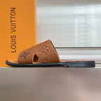 Tan Louis Vuitton monogram slide sandals with low flat sole