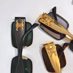 Celine sunglasses close-up with black frame and gold details, plus tortoise frame