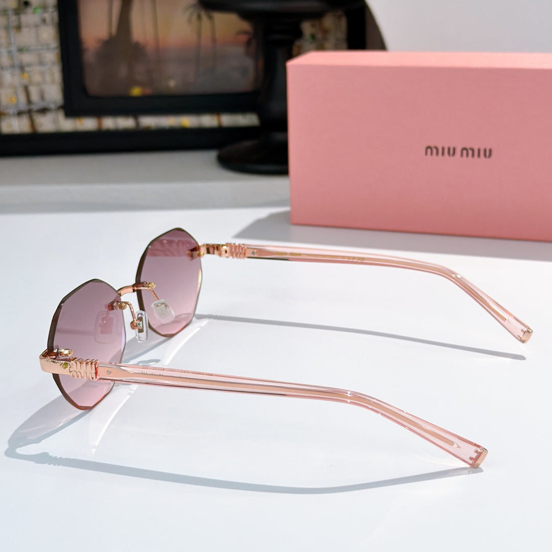 Sunglasses with rose-gold metal frame and pink-tinted lenses, clear temples