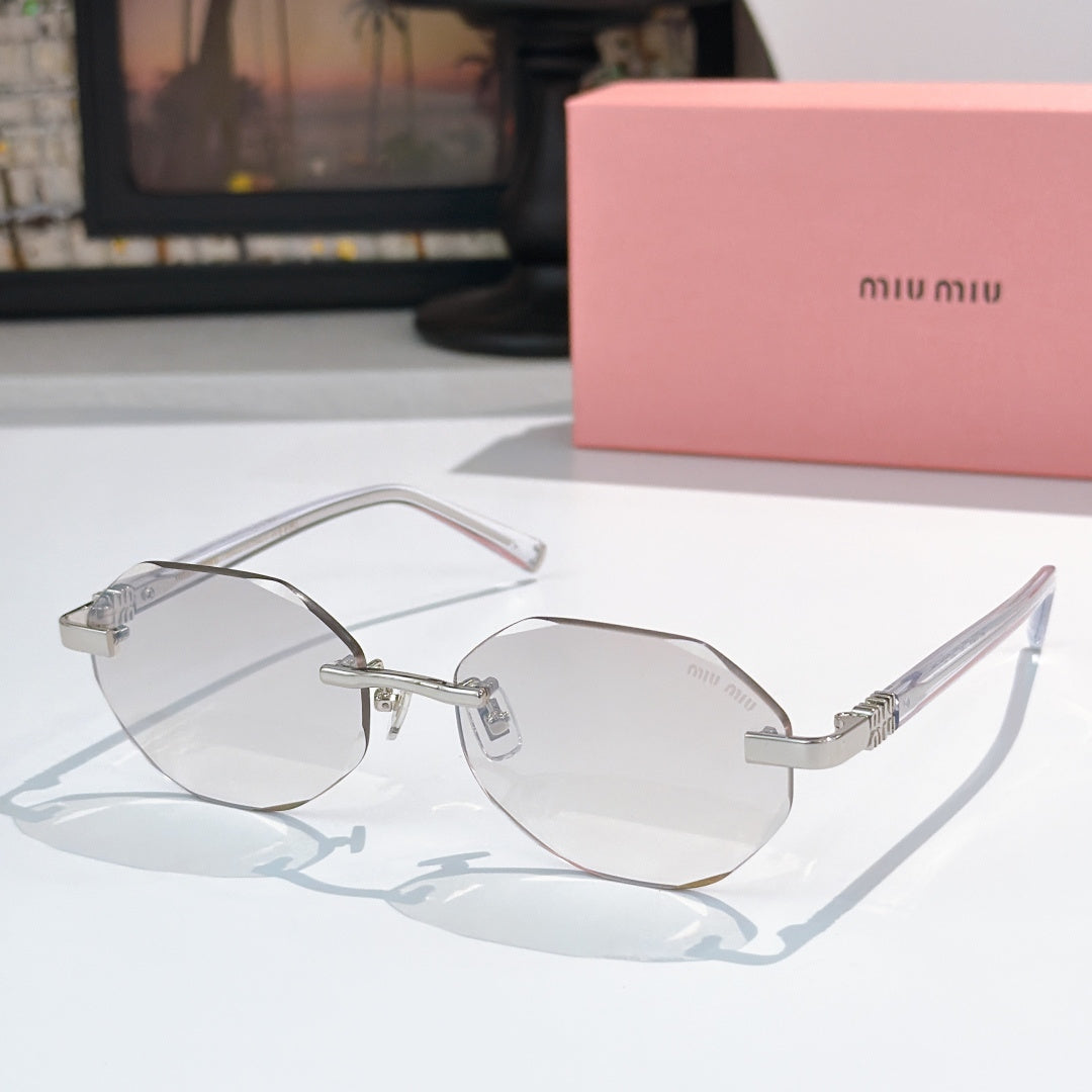 Sunglasses with clear/gray acetate frames and clear lenses, silver-tone hinges