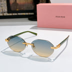 Sunglasses with olive acetate frames and light blue mirrored lenses, gold-tone detail