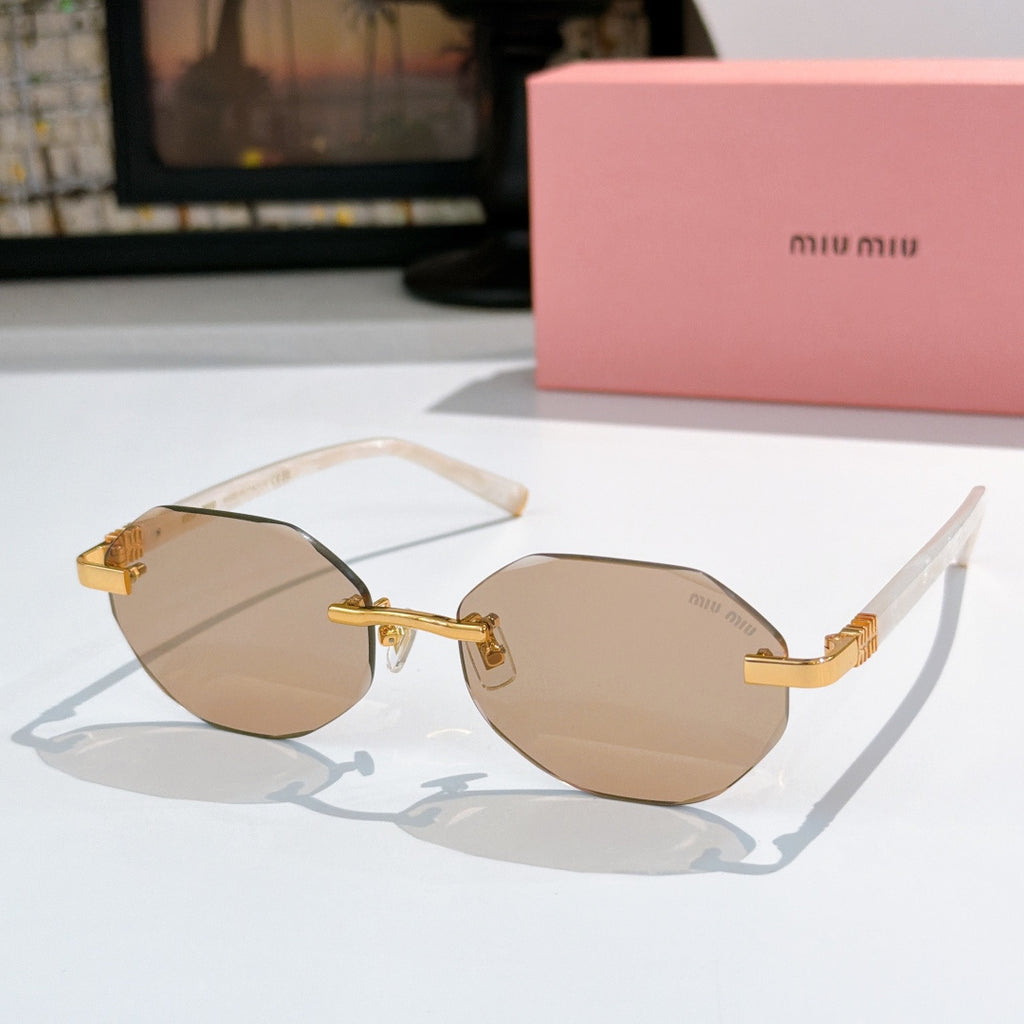 Sunglasses with beige acetate frames and warm brown tinted lenses, gold-tone hinges