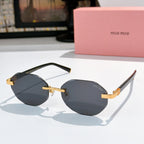 Sunglasses with dark frames and smoky gray mirrored lenses, gold-tone hinges