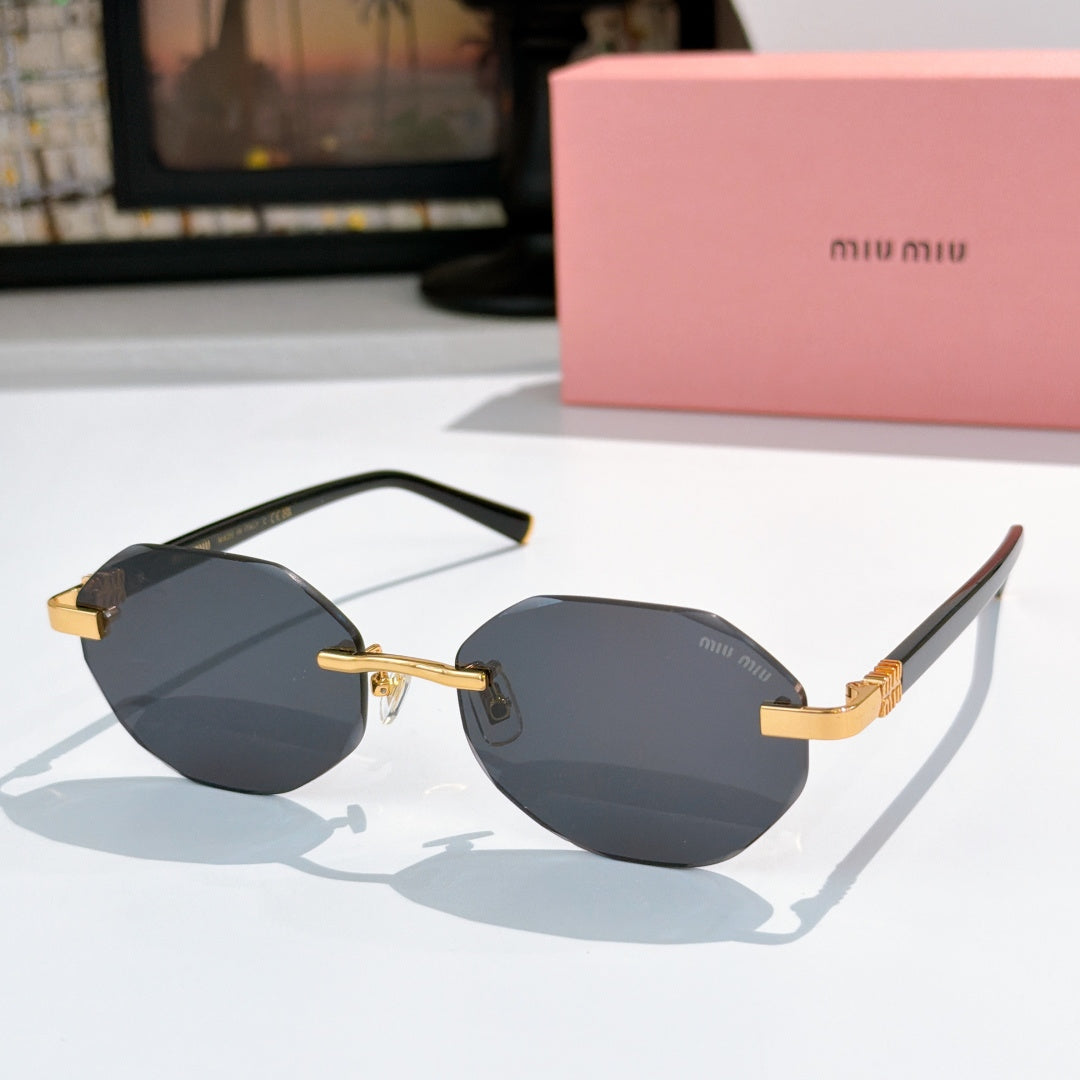 Sunglasses with dark frames and smoky gray mirrored lenses, gold-tone hinges