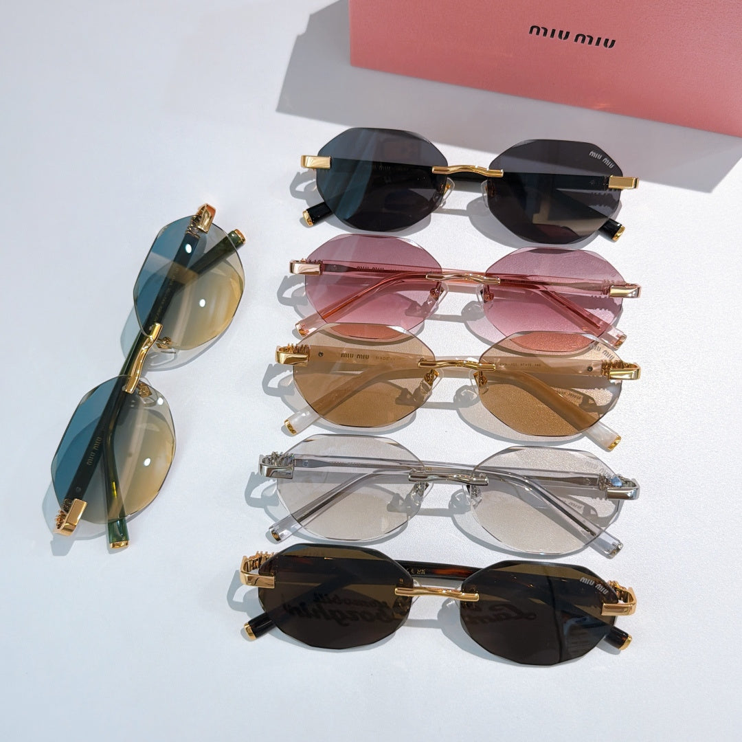 Assorted sunglasses with mixed frames and colored lenses, stacked with gold-tone details