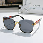 Black cat-eye sunglasses with dark lenses and red logo temple band