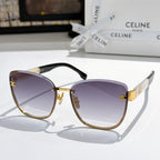 Black cat-eye sunglasses with purple gradient lenses and gold temple accents