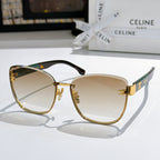 Gold-rim cat-eye sunglasses with light tan gradient lenses and black arms