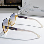 Celine sunglasses side view with dark lenses, gold-tone frame, and white temple detail